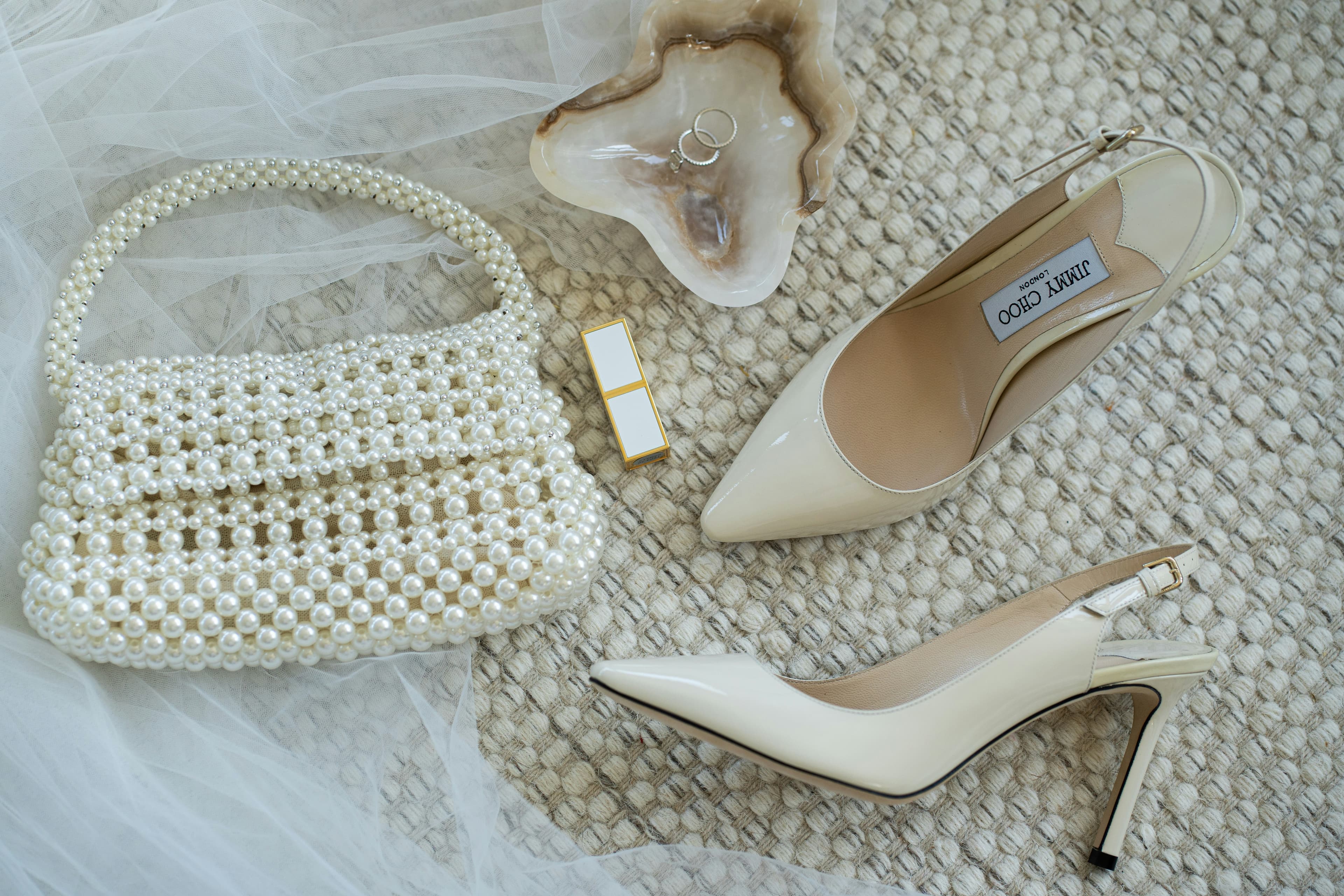 Elegant wedding shoes and accessories arrangement showcasing our premium collection