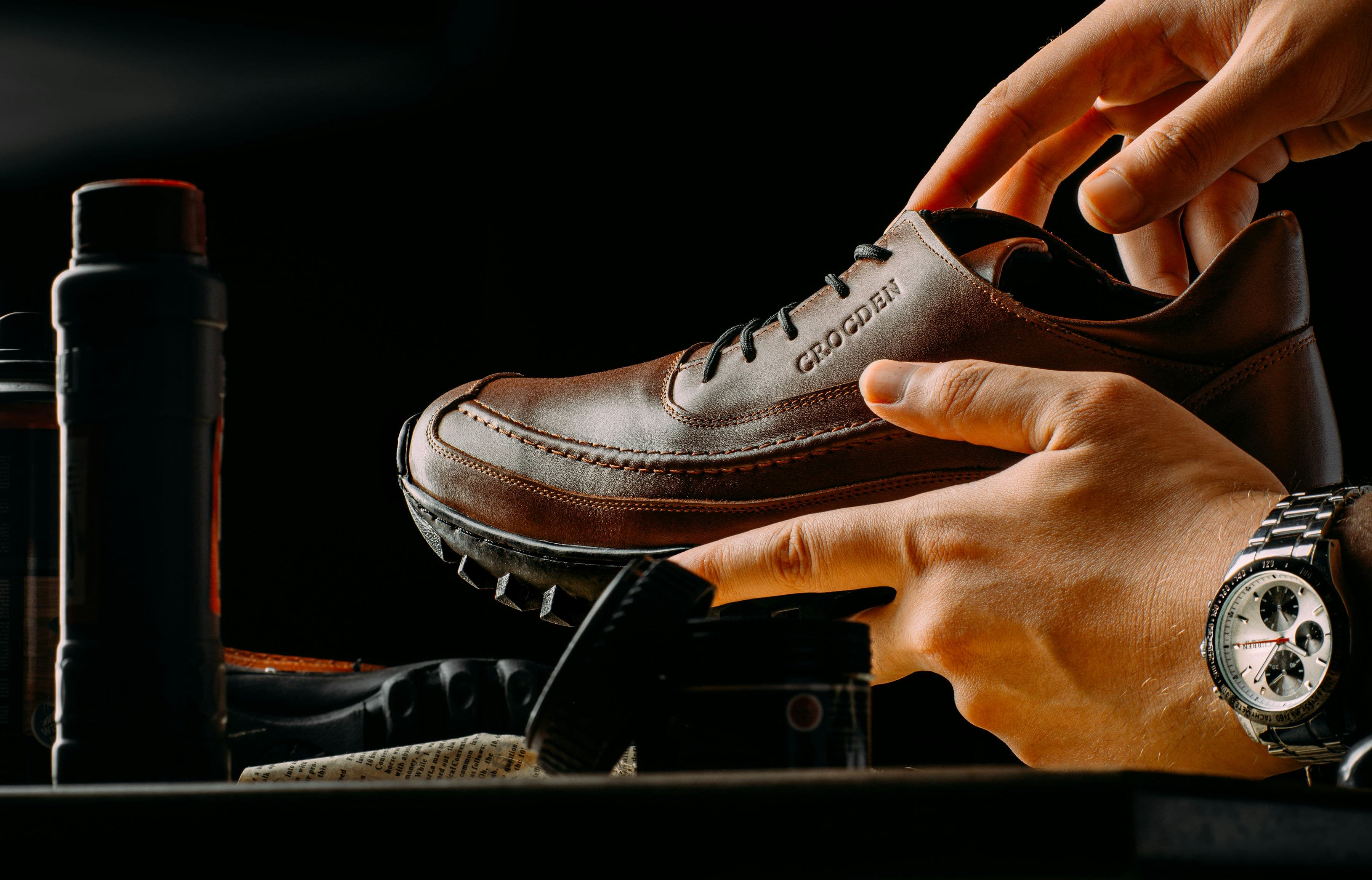 Professional shoe repair service showing skilled craftsmanship